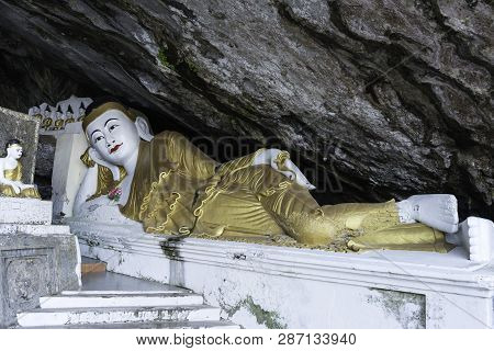 Hpa-an, Myanmar - 19 November, 2018: Horizontal Picture Of Reclined Buddha Statue Inside Yathaypyan 