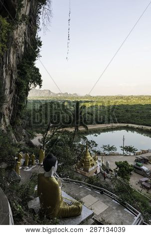 Hpa-an, Myanmar - 19 November, 2018: Vertical Picture Of The Entrance Of Yathaypyan Cave With A Huge