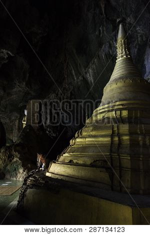 Hpa-an, Myanmar - 19 November, 2018: Vertical Picture Of Golden Pagoda At Yathaypyan Cave, An Import