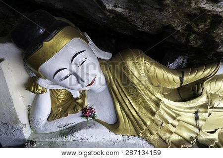 Hpa-an, Myanmar - 19 November, 2018: Horizontal Picture Of Huge Reclined Buddha Statues At Yathaypya