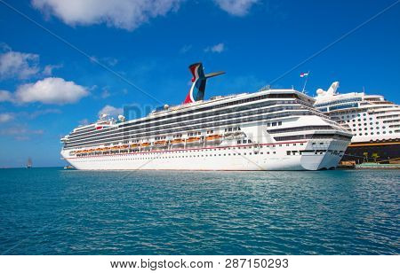 NASSAU - February 12: Carnival Liberty visiting Nassau on the cruise in Caribbean sea on February 12, 2019 in Nassau, Commonwealth of the Bahamas. Nassau is capital and cruise destination of Bahamas.