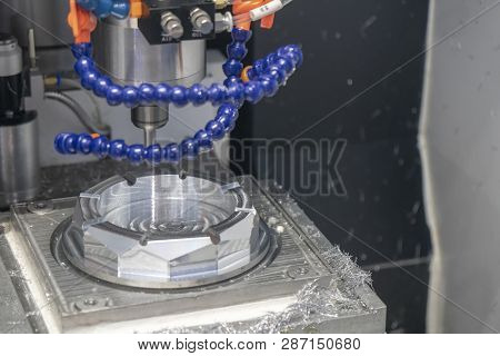 The  Cnc Milling Machine Cutting The Mould Part With The Solid Ball End Mill Tool.the Hi-technology 