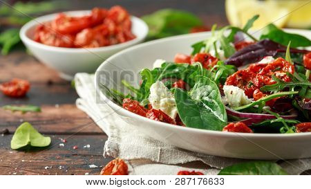 Sun Dried Tomatoes Salad With Fresh Vegetables Mix And Mozzarella Cheese. Healthy Food. Closeu Up
