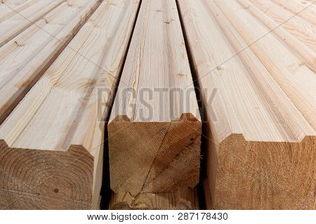 Wood At The Sawmill. Lumber Is Stored In The Warehouse.