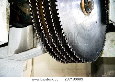 Industrial Circular Saws On A Stone. Close-up. Industrial Machine For Sawing Stone Blocks.