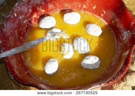 Stuffed Ascolana Olives Immersed In The Egg During The Preparation
