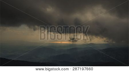 View From Above On The Forests Of The Greek Island Of Evia With The Sea And Clouds On The Horizon On