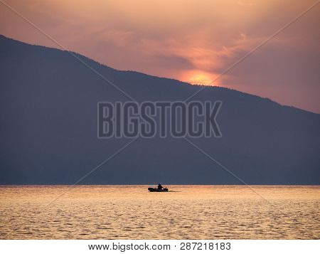 Waves And Beautiful Sunset On The Greek Island Evia (euboea) In The Aegean Sea
