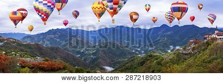 Colorful Hot Air Balloon Fly Over Panorama Nature Landscape Of Mountain View From Cingjing Farm, Nan