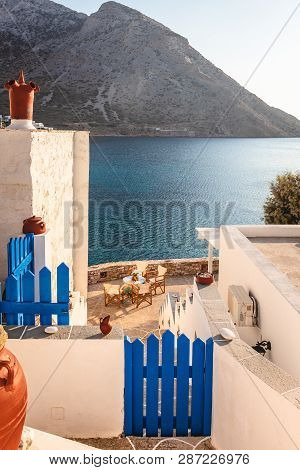 Sifnos, Greece - September 10, 2018: Traditional Greek House Overlooking The Bay Of The Island Of Si