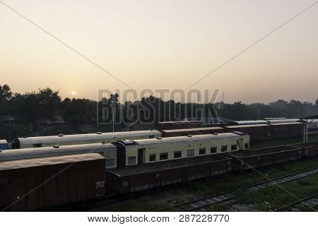 Thazi, Myanmar - 23 November, 2018: Horizontal Picture Of Beautiful Sunrise Over The Trains At Thazi