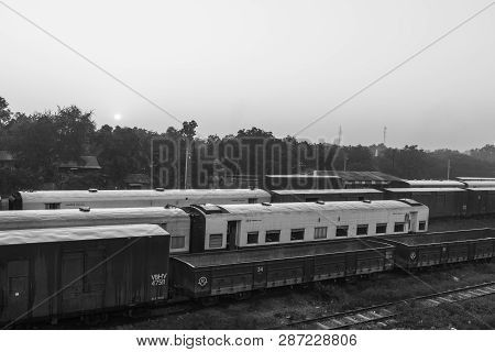 Thazi, Myanmar - 23 November, 2018: Black And White Picture Of Sunrise Over The Trains At Thazi Trai
