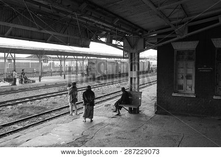 Thazi, Myanmar - 23 November, 2018: Black And White Picture Of People Waiting Train At Thazi Train S