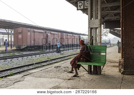 Thazi, Myanmar - 23 November, 2018: Horizontal Picture Of People At Thazi Train Station During Sunri