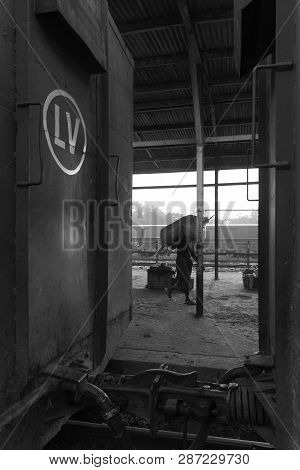 Thazi, Myanmar - 23 November, 2018: Black And White Picture Of Burmese People Working At Thazi Train