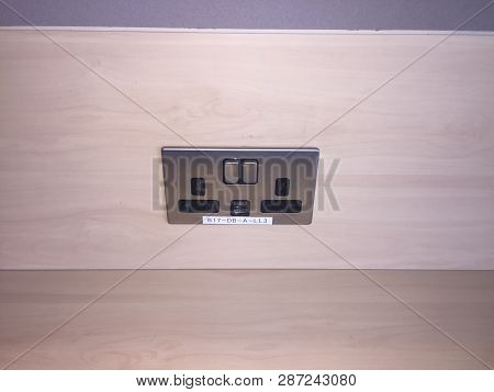 Uk Brushed Stainless Steel Double Plug Socket With Built In Usb Charger.