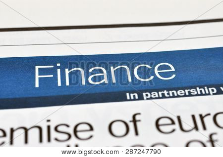 Heading A Finance In The Newpaper. Concept Finance.