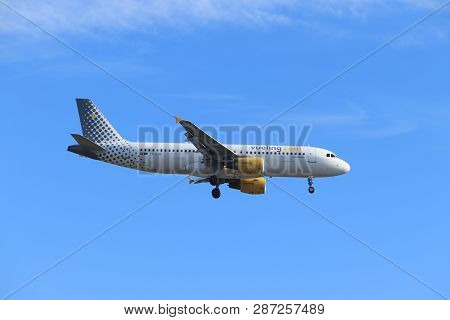 Amsterdam, The Netherlands - February, 24th 2019: Ec-lob Vueling Airbus A320 Approaching Polderbaan 