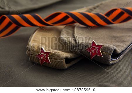 Part Of The Uniform Of The Soviet Soldier On The Day Of Victory: Forage-cap And St. George Ribbon.