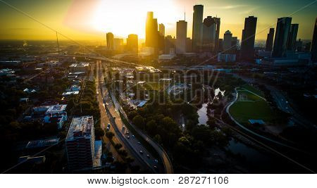 Golden Hour Sunrise With Sun Beams And Golden Sun Rays Houston , Texas , Usa Modern Skyscraper Risin