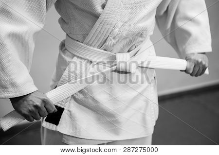 Young Girl Dressed In Hakama Practicing Aikido