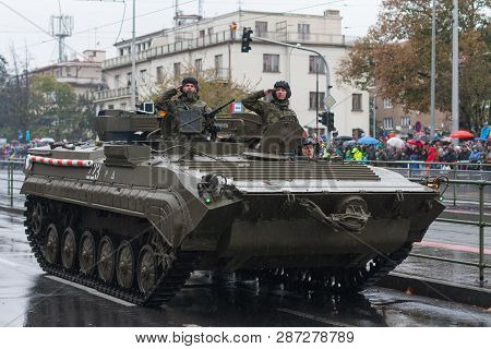 European Street, Prague-october 28, 2018: Soldiers Of Czech Army Are Riding  Recovery Tracked Vehicl