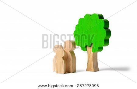 Family Figures Are Standing Near The Tree On An Isolated Background. Pastime With Family, Kinship An