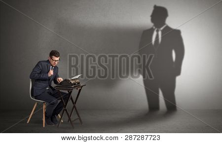 Shadow threatening hard worker man who is afraid