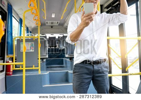 Young Businessman Passenger Use Time In The Bus