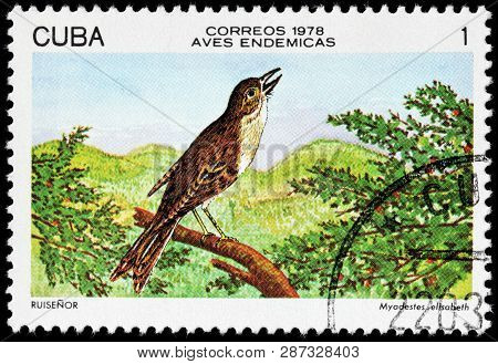Luga, Russia - February 17, 2019: A Stamp Printed By Cuba Shows Cuban Solitaire, Also Known As Cuban