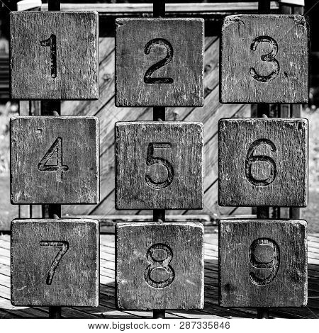 Tris Game With Arabic Numbers, Game For Children In Outdoor Area, Black And White Version