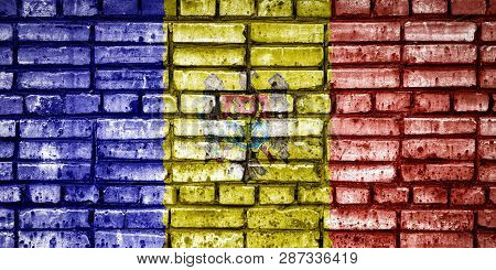 National Flag Of Moldavia On A Brick Background. Concept Image For Moldavia: Language , People And C