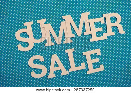 Summer Sale Alphabet Letters With Spce Copy On Blue Polka Dot Background