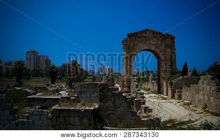 Remains Of Necropolis And Arch In Ancient Columns Excavation Site In Tyre At Lebanon