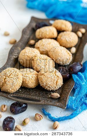 Traditional Moroccan Ghribas Cookies On A Bronze Tray Close-up, Selective Focus.