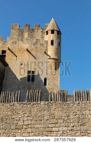 The Medieval Chateau De Beynac Rising On A Limestone Cliff Above The Dordogne River. France, Dordogn
