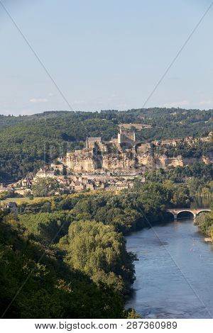 The Medieval Chateau De Beynac Rising On A Limestone Cliff Above The Dordogne River Seen From Castel