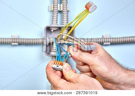 Electrical Junction Box In  Process Of Installation By Electrician With Help Of Pluggable Connectors