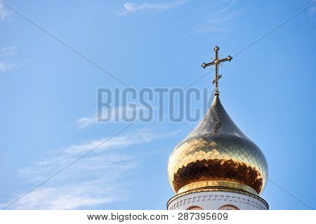 Golden Dome And Cross Of Church Of The Beheading Of St. John The Baptist  In European City Grodno Or