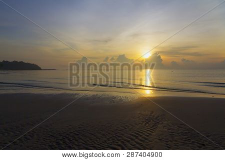 Sunrise In The Sea On Beach At Thung Wua Lan Beach, Chumphon Province Thailand