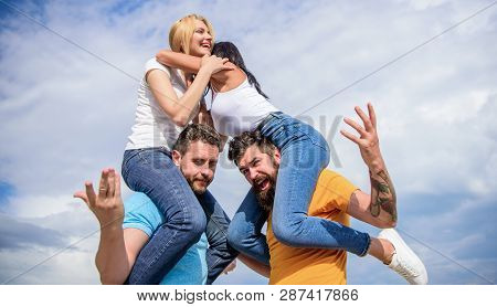 Twice Fun On Double Date. Friendship Of Families. Couples In Love Having Fun. Men Carry Girlfriends 