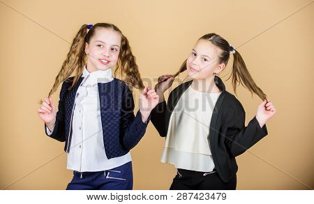Hairstyle For Female. Cheerful Friends Made Same Hairstyle For Fun. We Look Like Sisters. Best Frien