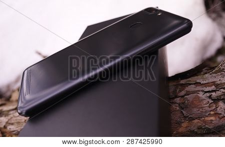 Modern Mobile Phone With Large Screen, Close-up And Assembly Details