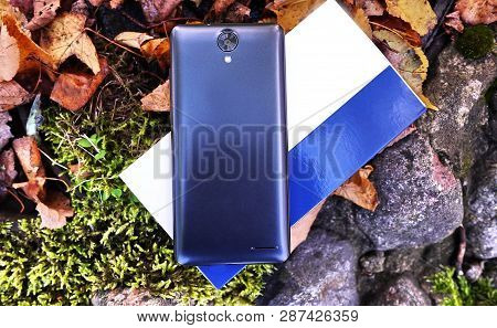 Modern Mobile Phone With Large Screen, Close-up And Assembly Details