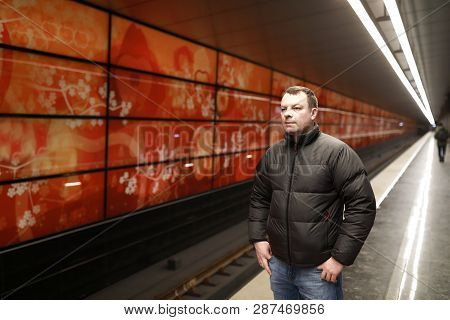 Man On Subway Station Platform