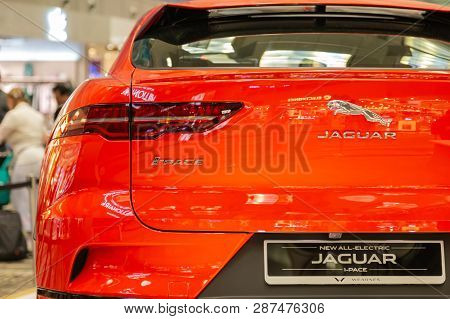 Singapore. March 2019. Orange Jaguar I-pace All Electric Suv. Taillights. Trunk Door And Rear Camera