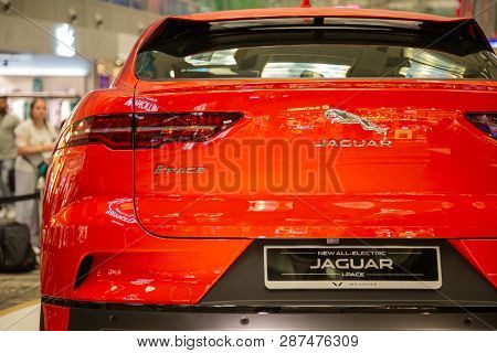 Singapore. March 2019. Orange Jaguar I-pace All Electric Suv. Taillights. Trunk Door And Rear Camera
