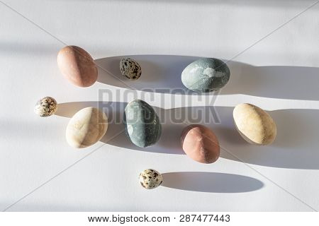 Easter Celebration Minimal Concept - Naturally Coloured Easter Eggs In Trendy Hard Direct Sunlight
