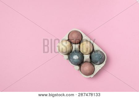 Selective Focus Of Coloured Decorated Easter Eggs In Cardboard Container
