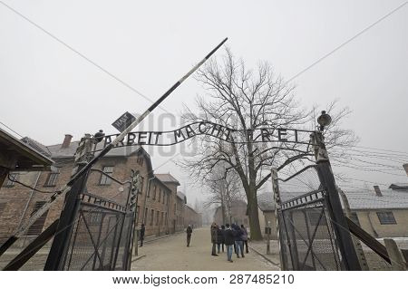 Krakow, Poland -january 21 2019: People In Front Of The Entrance Of The Auschwitz Nazi Concentration